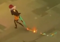Red dragging the sword along the ground, leaving a glowing trail